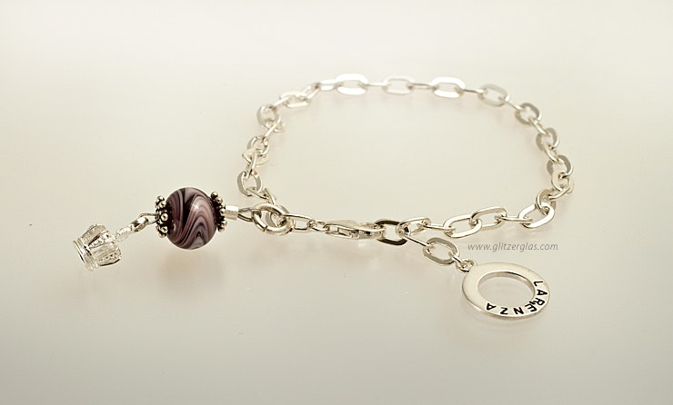 "kleiner-König" Silber925-Gliederarmband mit 1 Glasperle Violett mit Krönchen CHF 45.- "kleiner-König" Silber925-Gliederarmband mit 1 Glasperle Violett mit Krönchen CHF 45.-